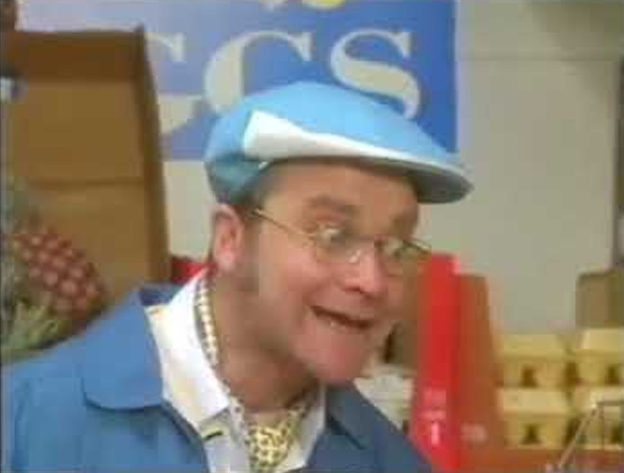 Harry Enfield in character as 'You don't want to do it like that!'